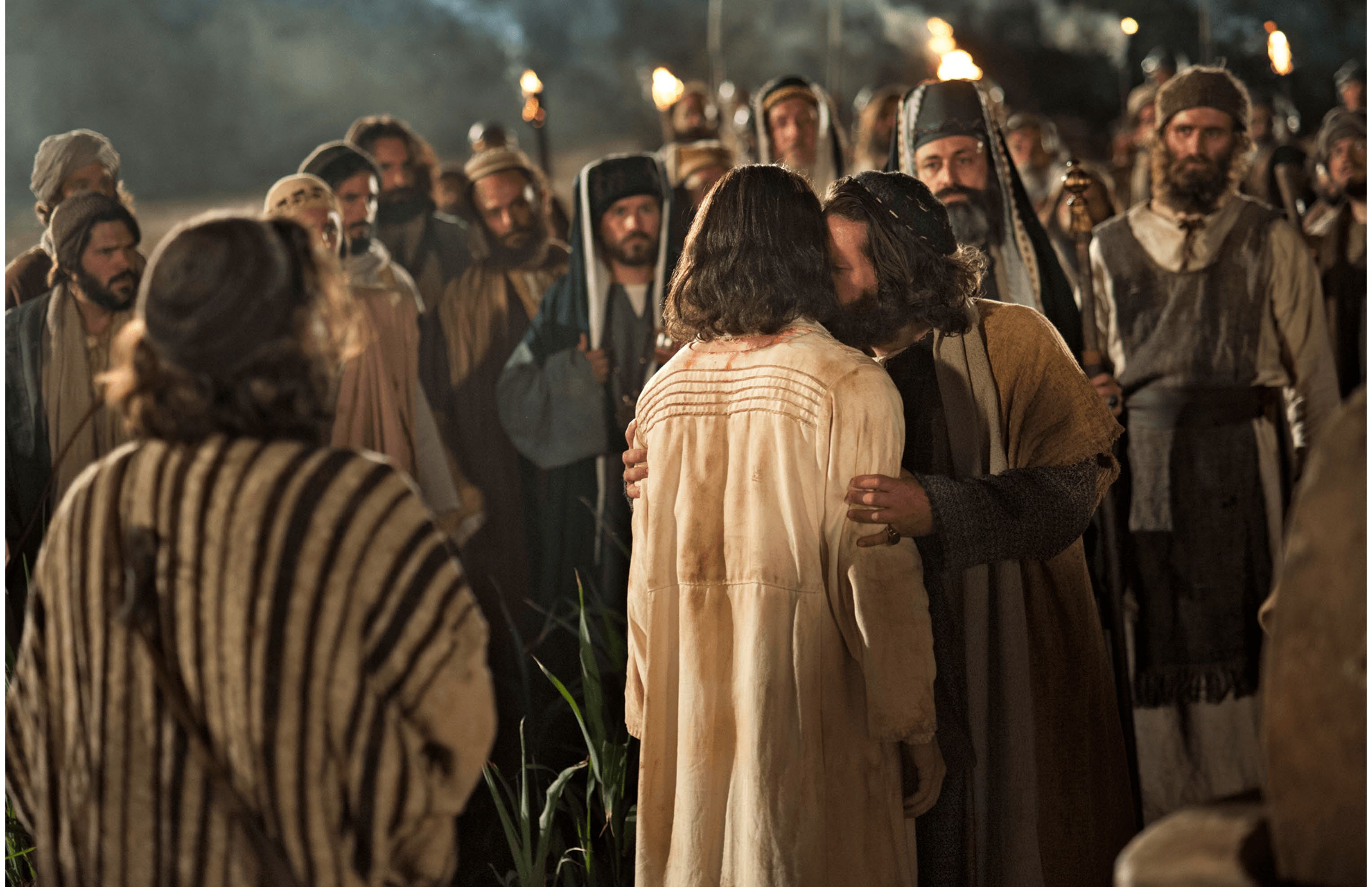 Judas betraying Jesus with a kiss in the garden