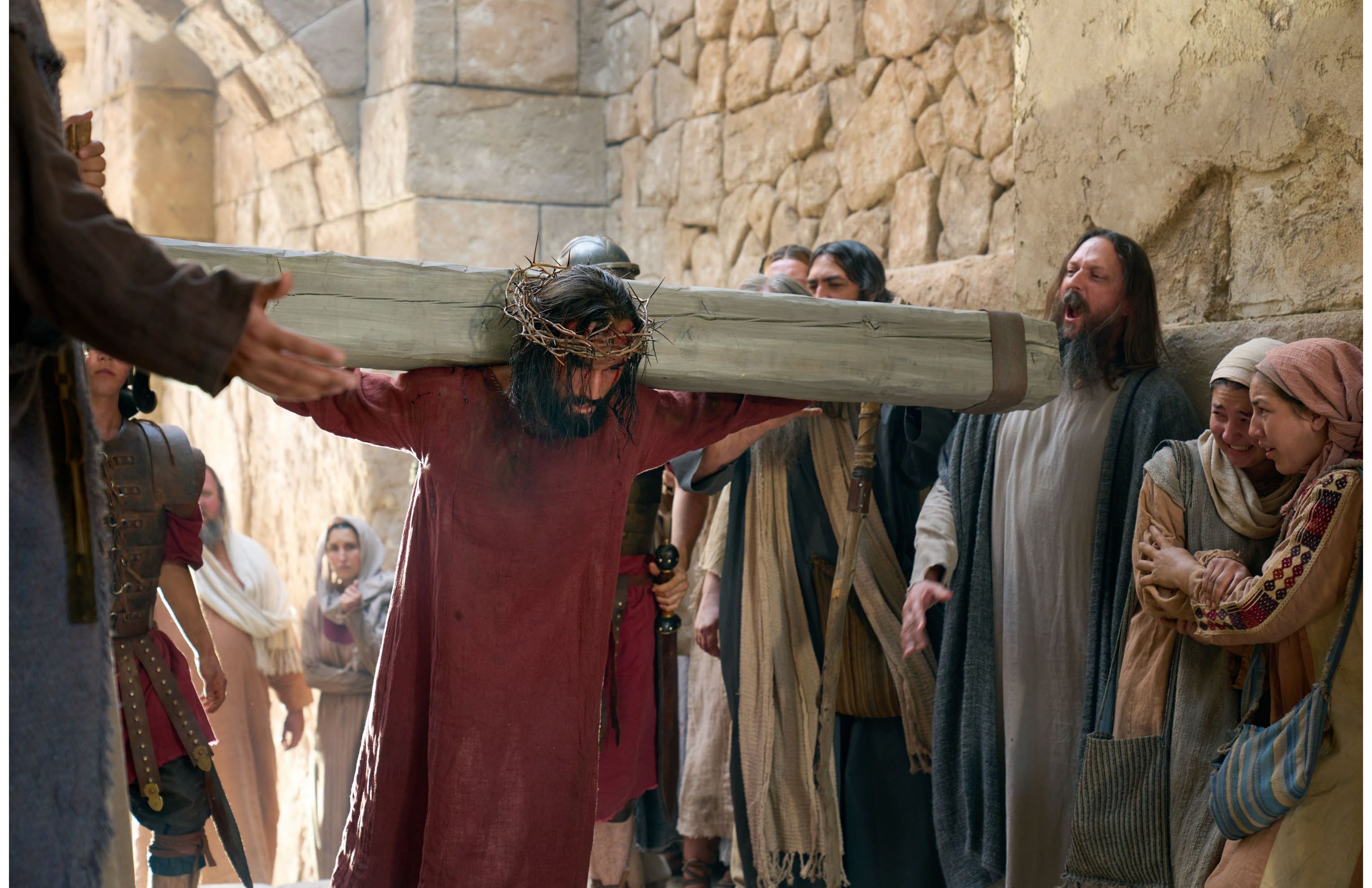 Jesus carrying the cross through Jerusalem on the Via Dolorosa