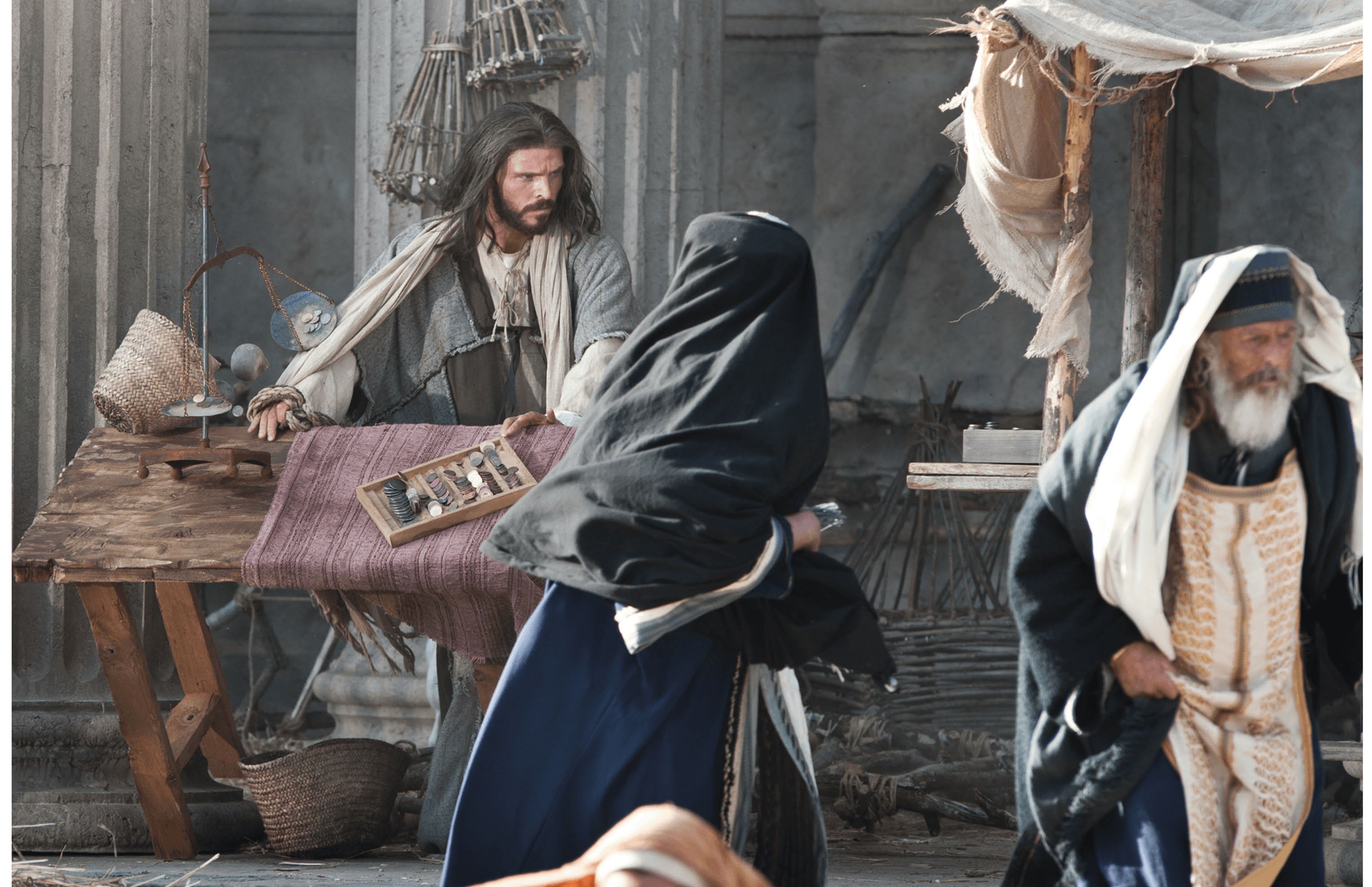 Jesus overturning the tables of money changers in the temple