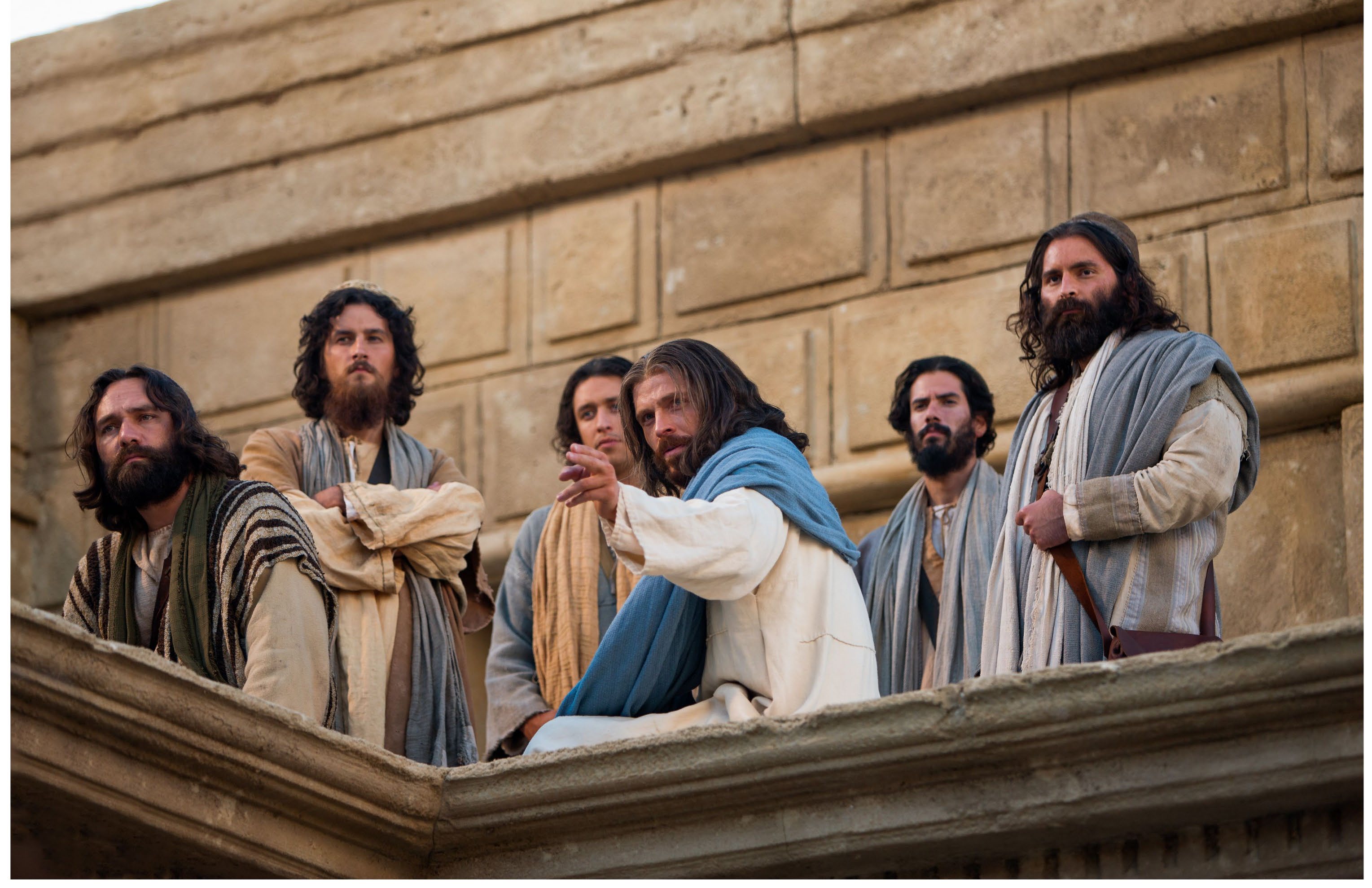 The crowd welcoming Jesus into Jerusalem with palms and jubilation